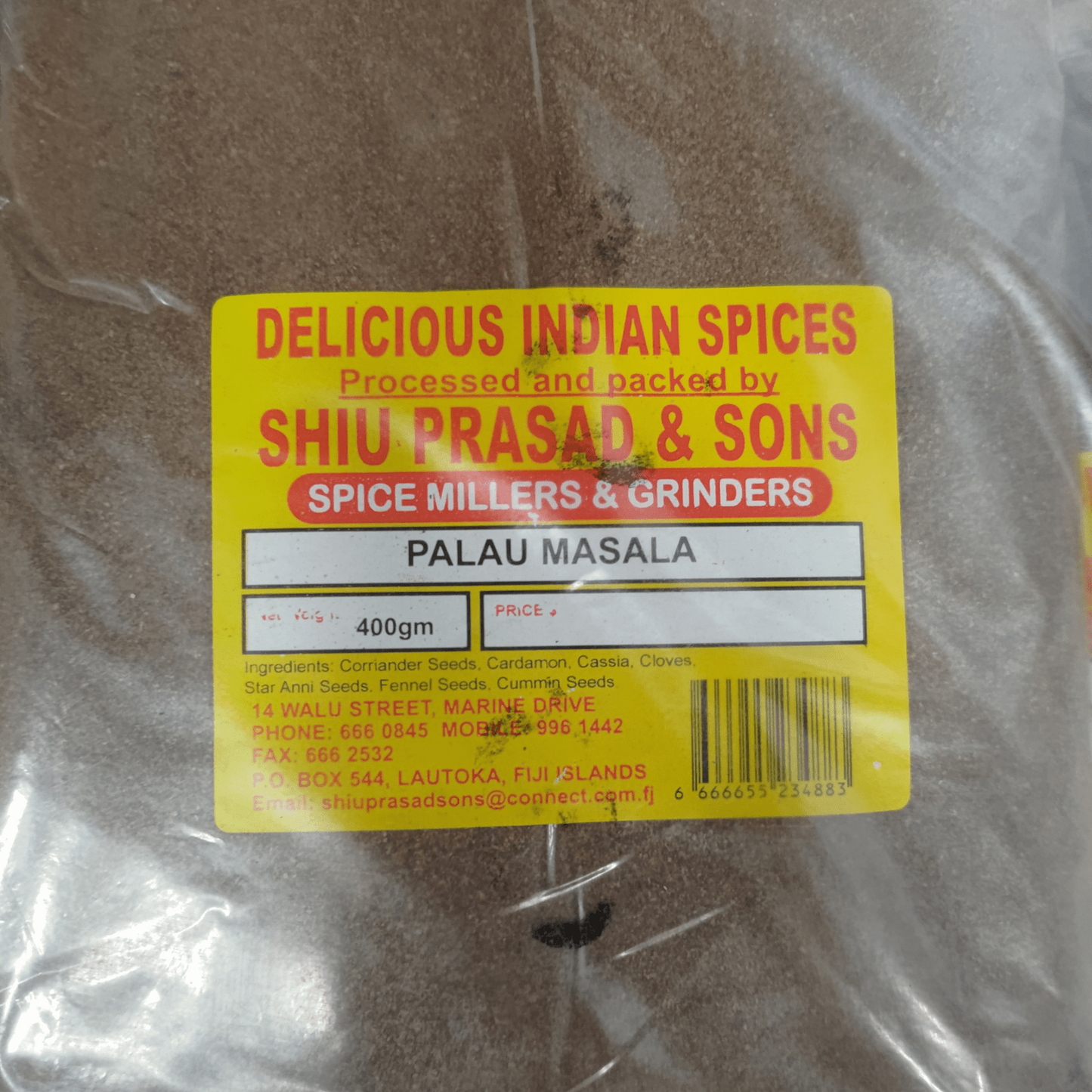 Shiu Prasad Palau Masala 400g label showing ingredients like cardamom and fennel in transparent packaging